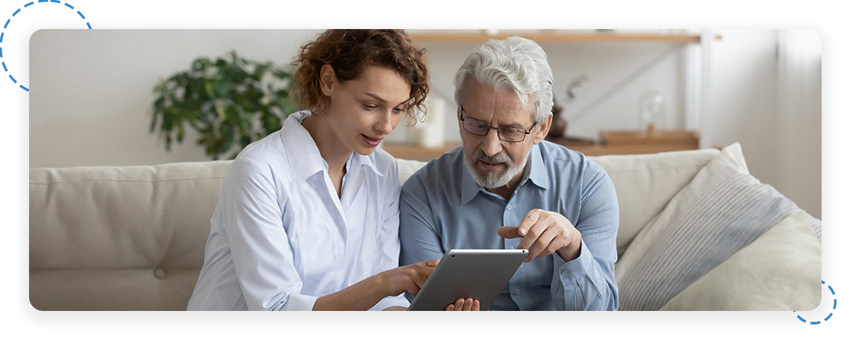 Provider and patient looking at tablet together
